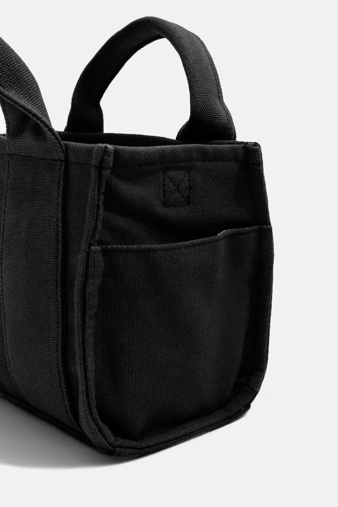 Baby Sloane Tote - Black Baby Sloane Tote - Black -Popflex Store BF PF Sloane Baby Tote Pocket Detail Black 7bc4c4aa b4e9 4189 aee6 ce51e79c9ca2