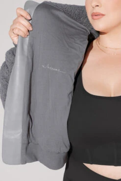 The Kinsley Bomber Jacket In Faux Sherpa - Grey 3 The Kinsley Bomber Jacket In Faux Sherpa - Grey -Popflex Store KinsleyBomberJacket 5020 Group 0040 Edit